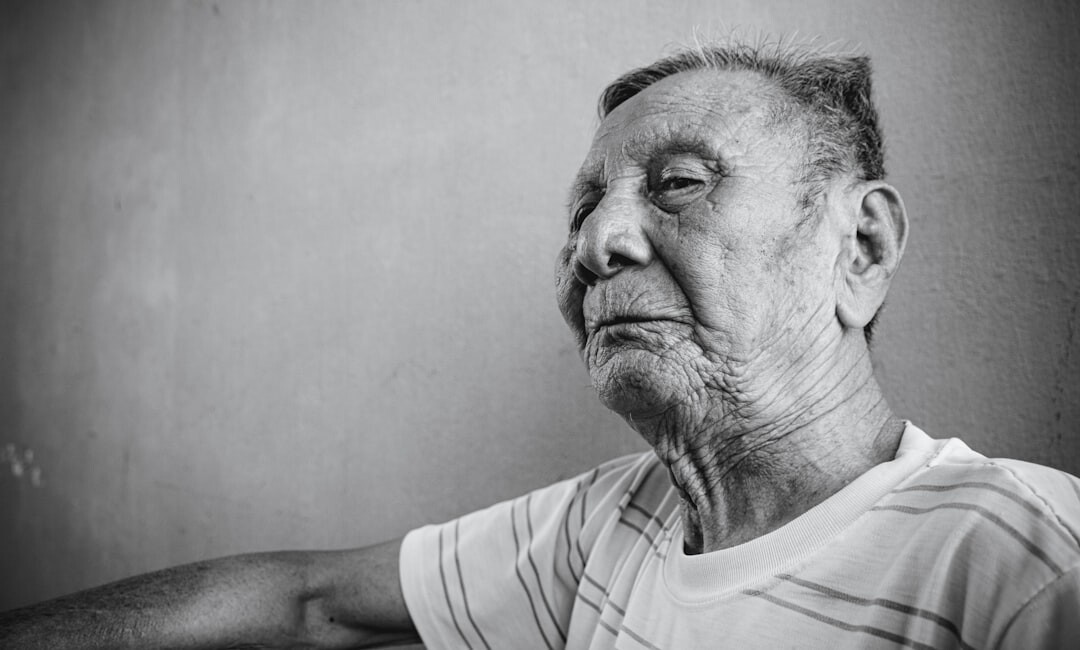 old person unplugging appliance