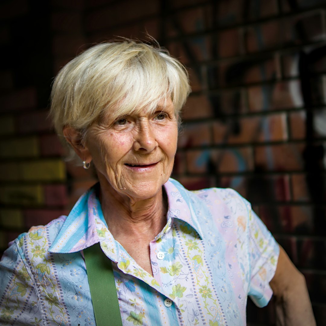 Portrait of a joyful senior Slovak woman outdoors