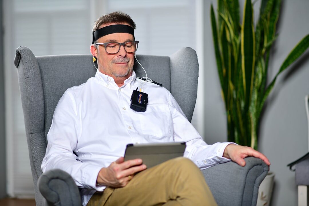 senior using tablet for health records