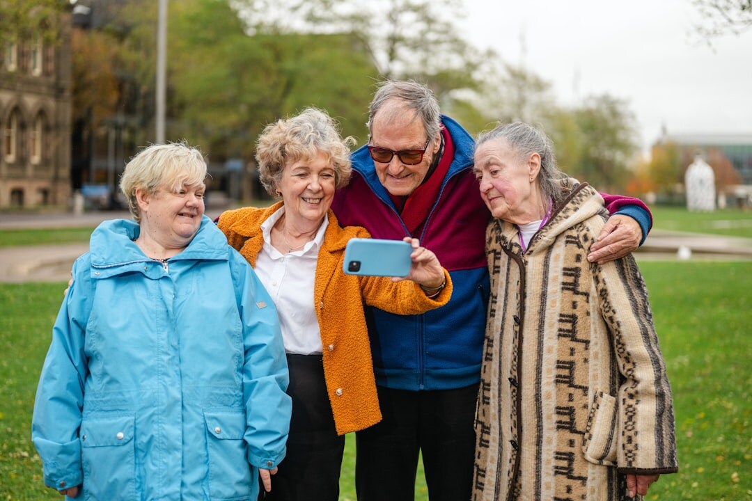 Group of active Slovak seniors laughing together outdoors